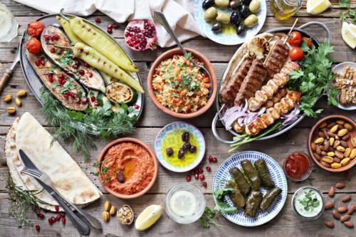 Middle eastern, arabic or mediterranean dinner table with grille