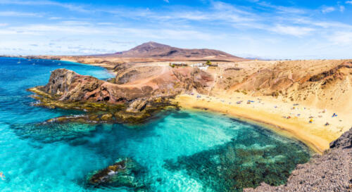 Landscape with turquoise ocean water on Papagayo beach, Lanzarote, Canary Islands, Spain